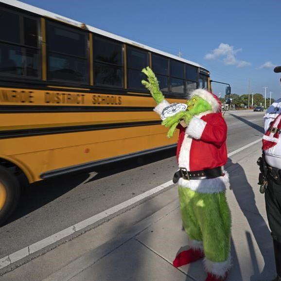 Deputy dressed as Grinch gives onions to speeding drivers